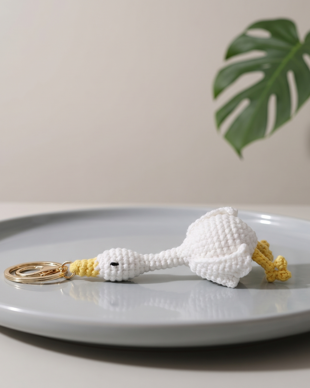 Handmade goose crochet keyring close-up detail