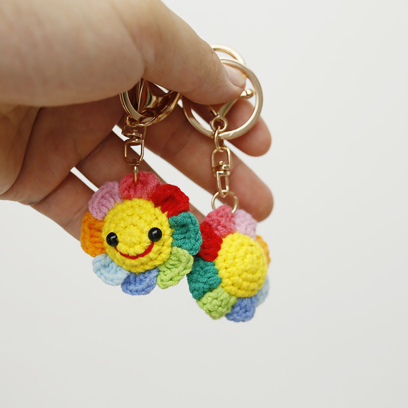 Handmade crochet rainbow flower keyring in multicolour yarn