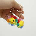 Handmade crochet rainbow flower keyring in multicolour yarn