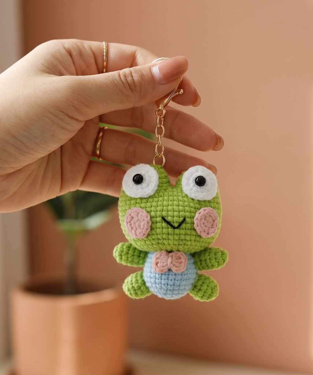 Large handmade crochet frog keyring in soft green yarn