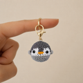 Handmade crochet mini penguin keyring in soft yarn