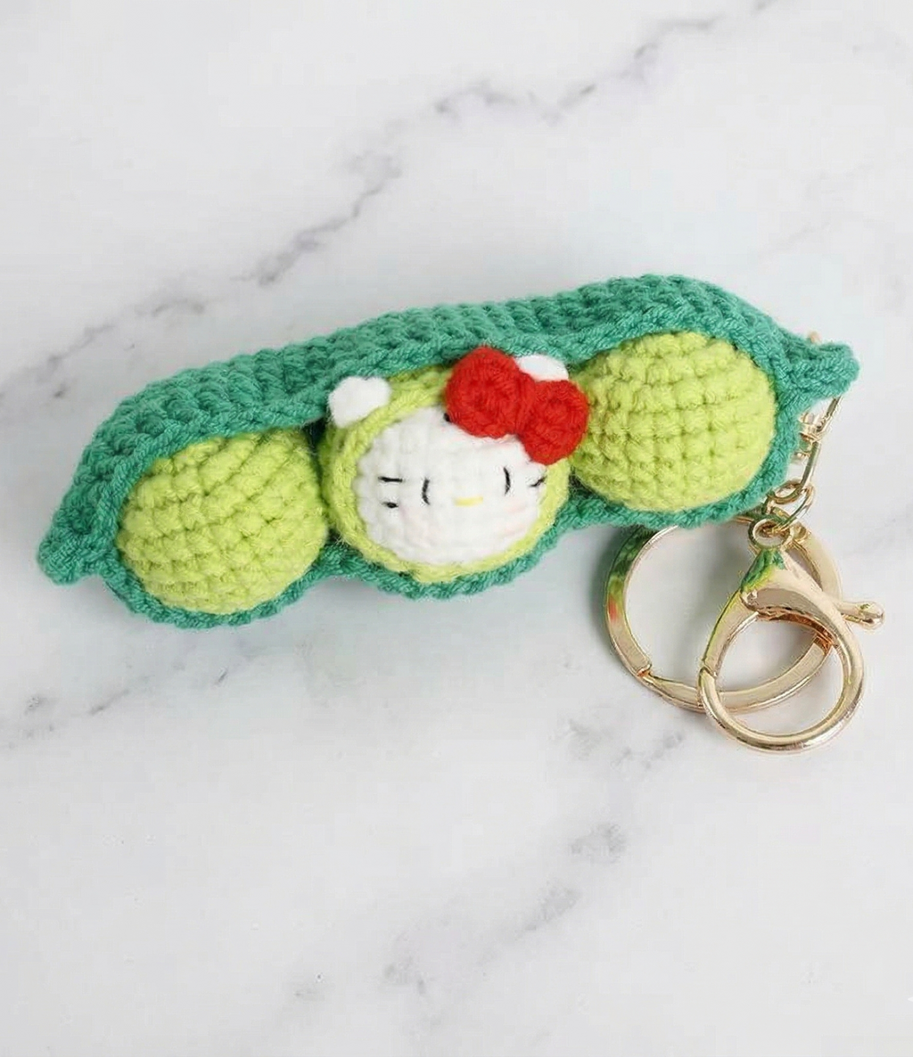 Handmade crochet pea pod keyring suitable as bag charm