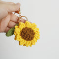 Handmade crochet sunflower keyring in yellow yarn