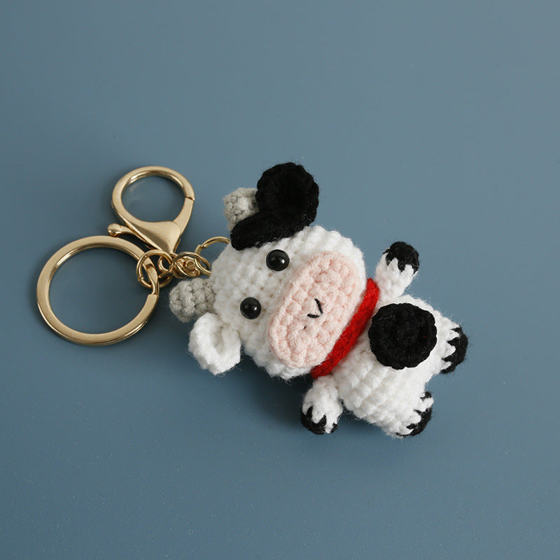 Handmade crochet cow keyring detail view