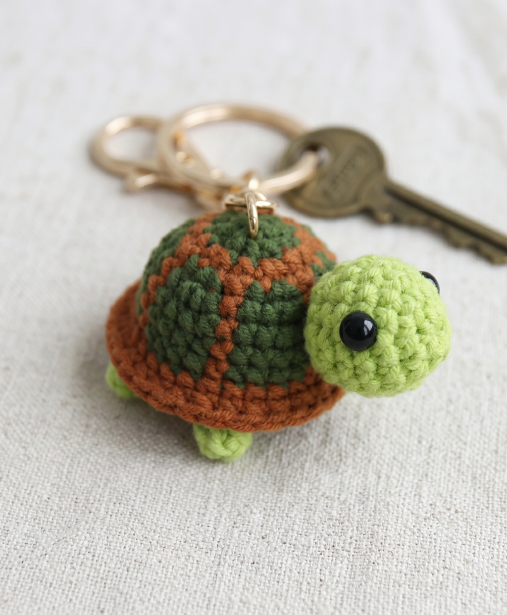 Crochet turtle keyring showing shell texture detail