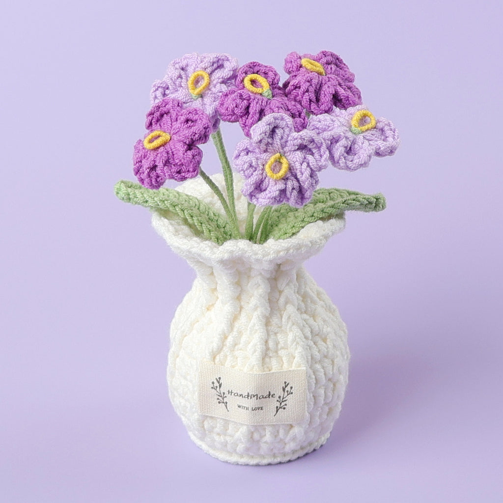 Handmade crochet forget-me-not medium plant pot with blue blooms