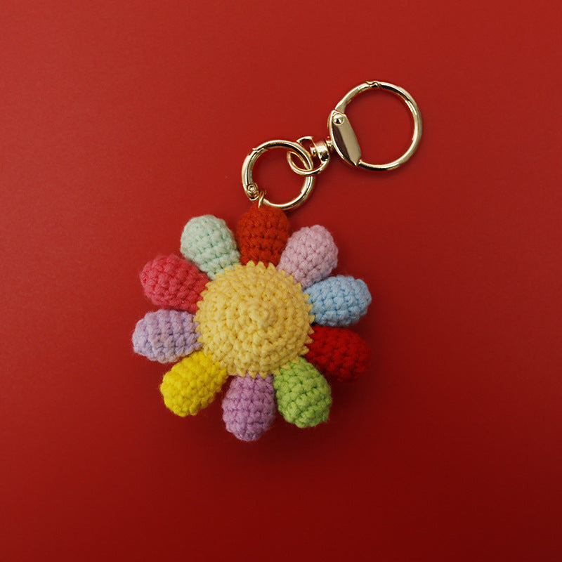 Large crochet rainbow flower keyring suitable as bag charm