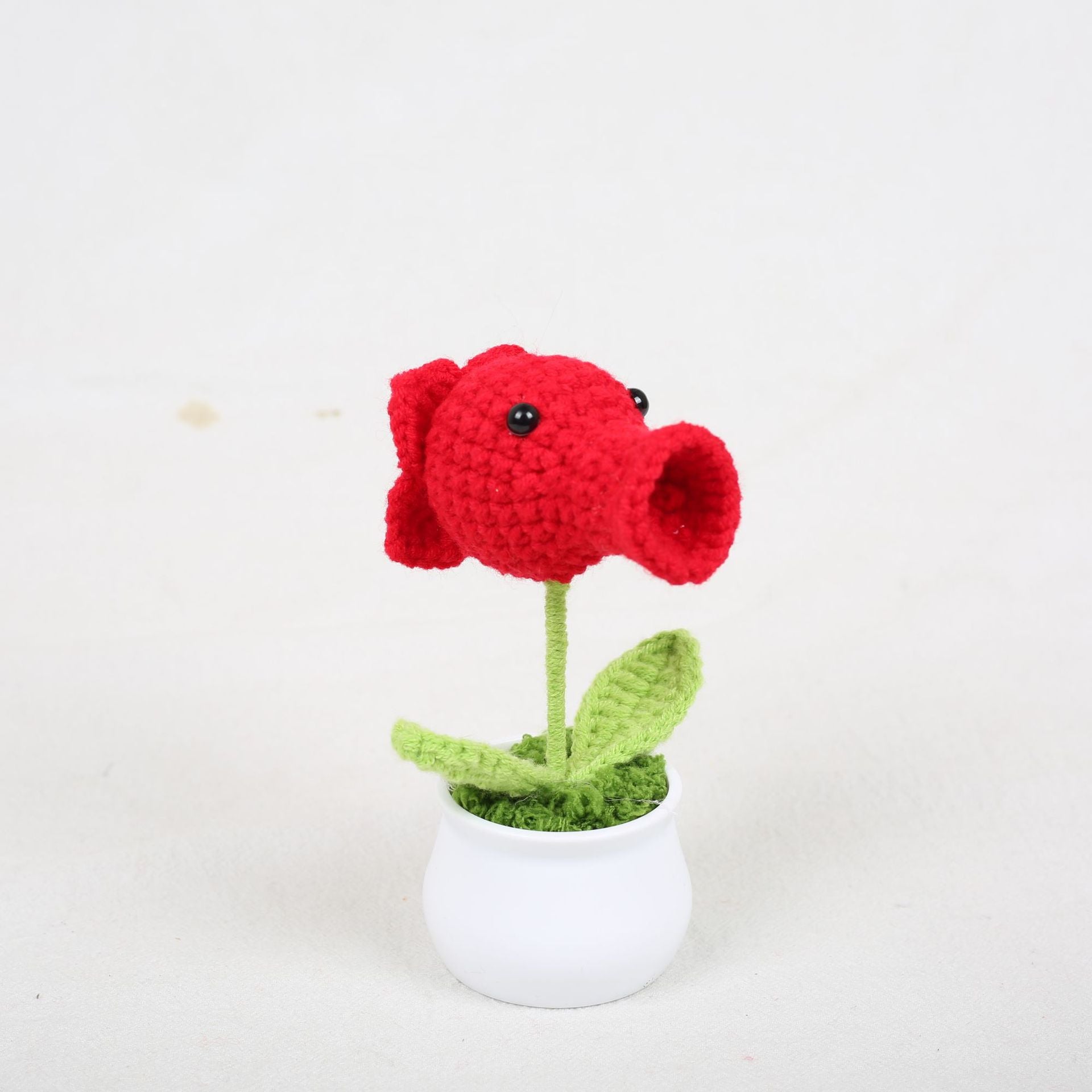 Crochet peashooter pot plant close-up detail