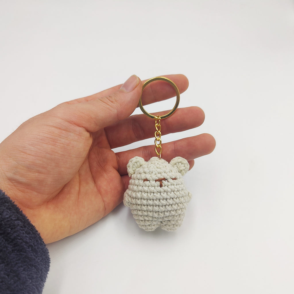 Handmade crochet bear keyring close-up detail