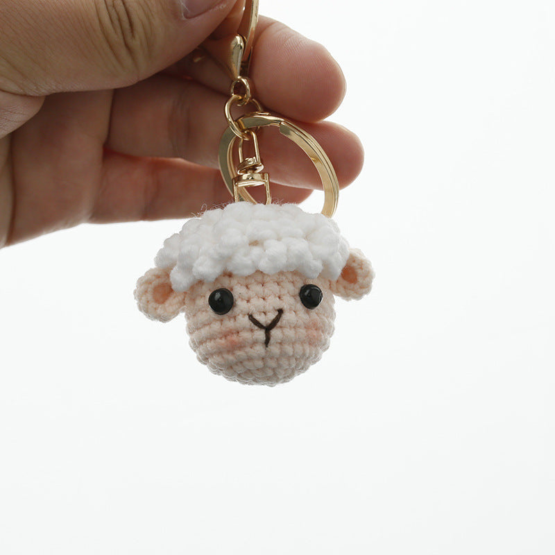 Crochet sheep keyring close-up showing woolly texture