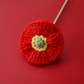 Small handmade crochet poppy stem with fine petals