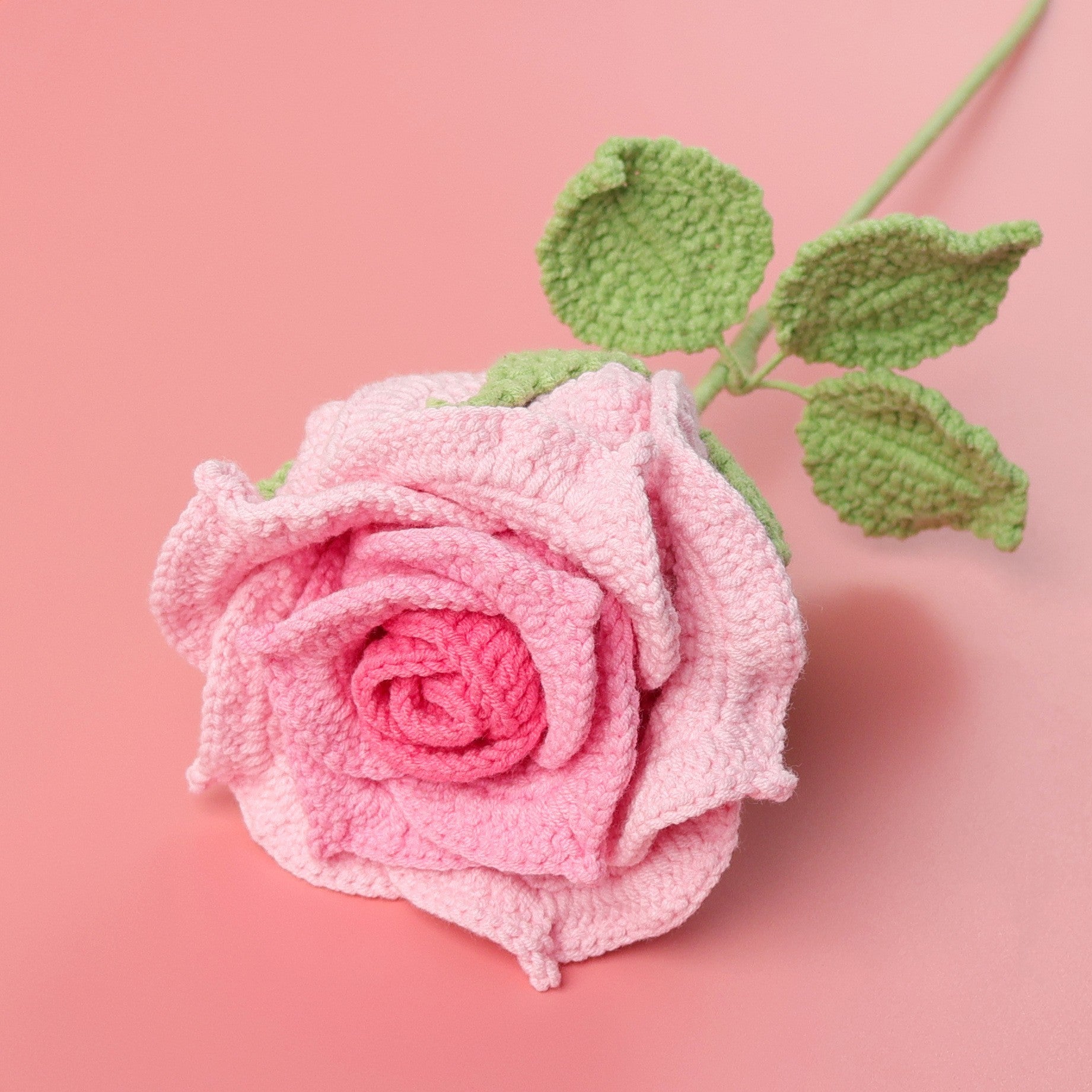 Crochet large rose stem showing full petal spread