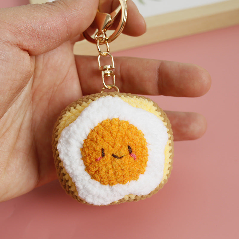 Handmade crochet toast keyring in golden yarn