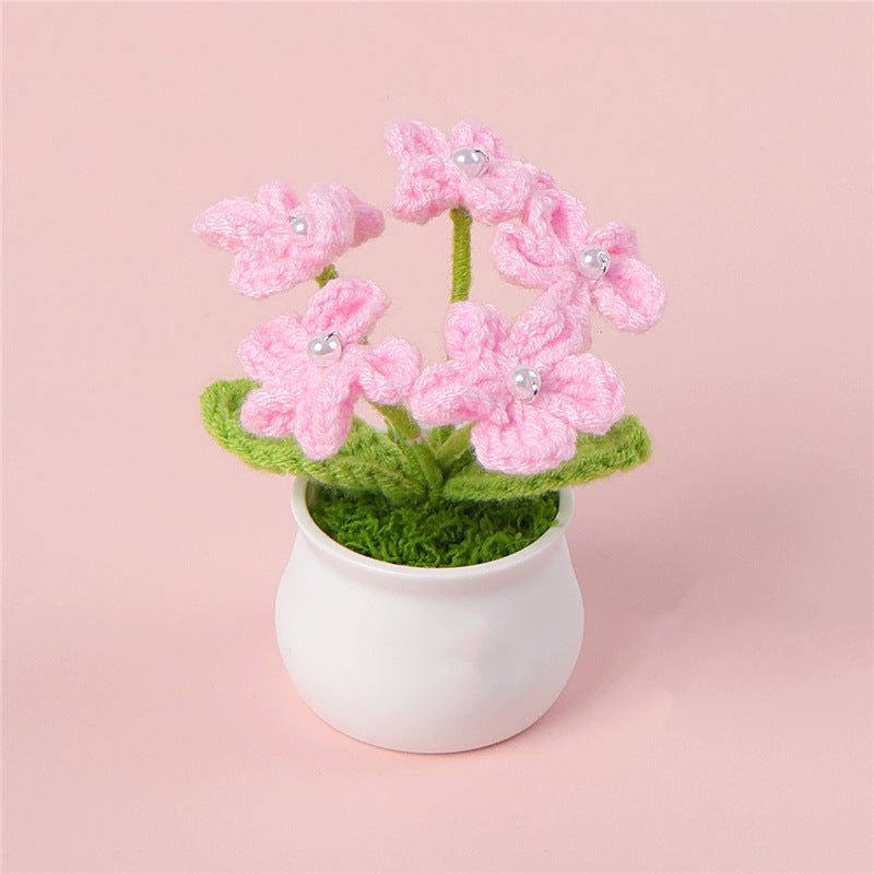 Crochet hydrangea plant pot on display