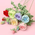 Handmade crochet rosa stem with layered petals in soft yarn
