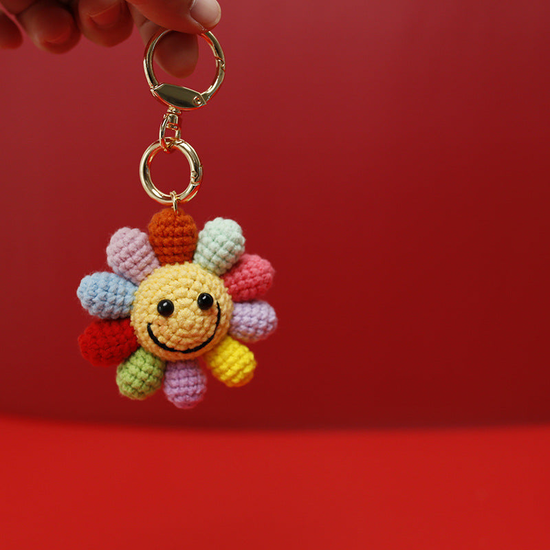 Large handmade crochet rainbow flower keyring in multicolour yarn