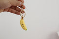 Handmade crochet banana keyring in yellow yarn