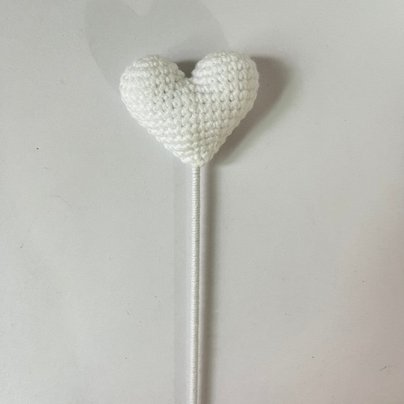 Crochet heart stem showing heart bloom detail