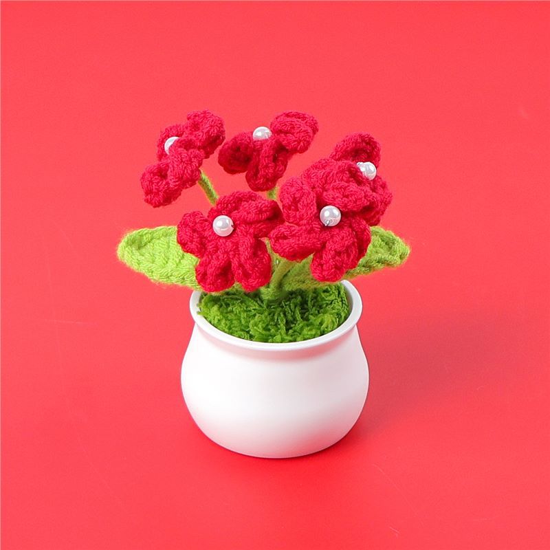 Handmade crochet hydrangea plant in a small decorative pot
