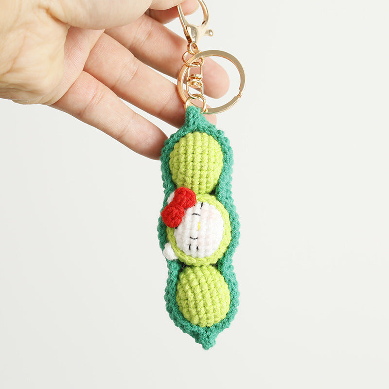 Handmade pea pod crochet keyring close-up detail