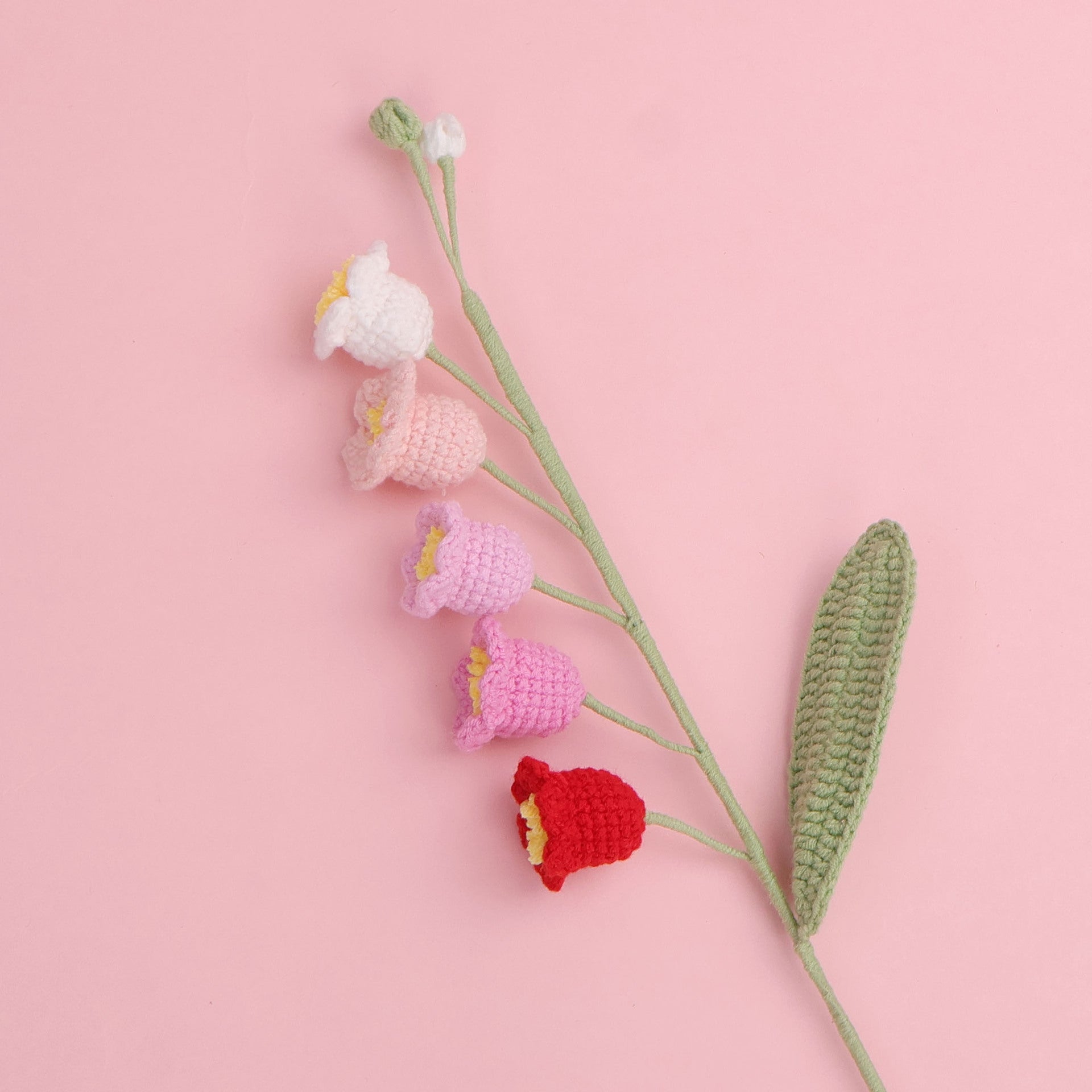 Crochet lily of the valley stem showing bell bloom detail