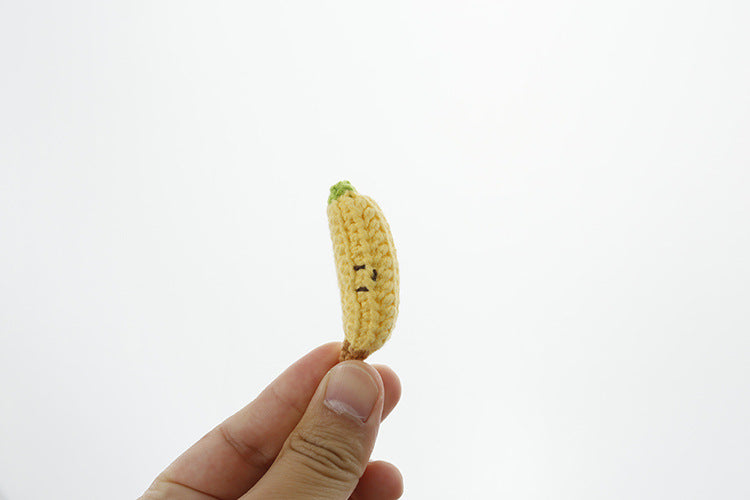 Handmade banana keyring showing curved shape