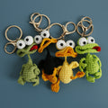 Handmade crochet derpy duck keyring in soft yellow yarn