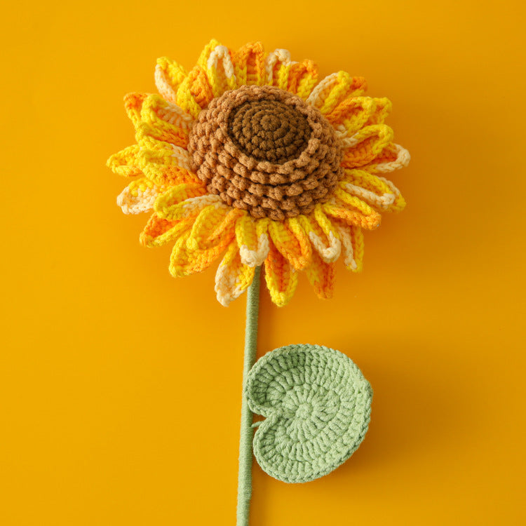 Crochet large sunflower stem showing full petal display