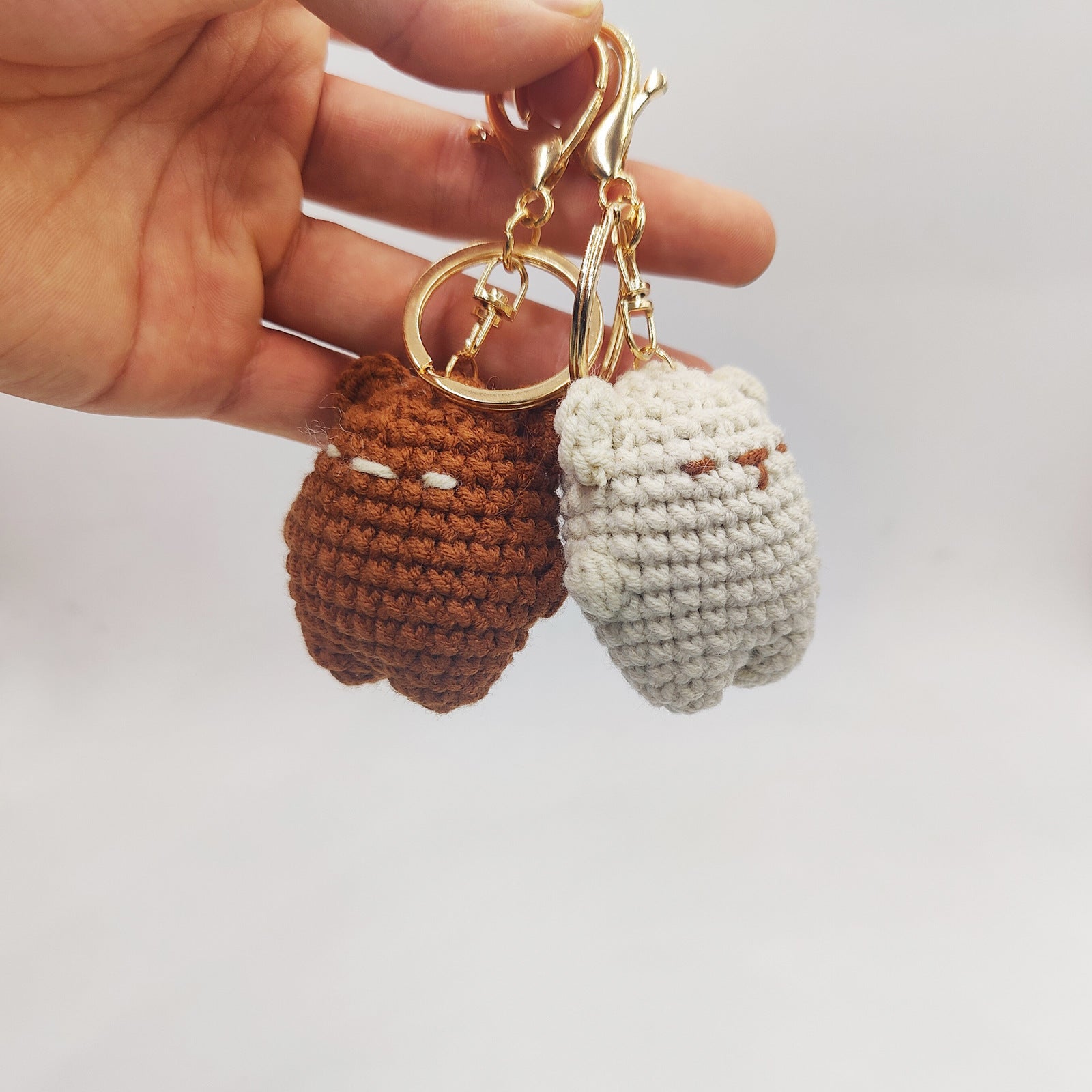 Crochet bear cookie keyring as a bag charm