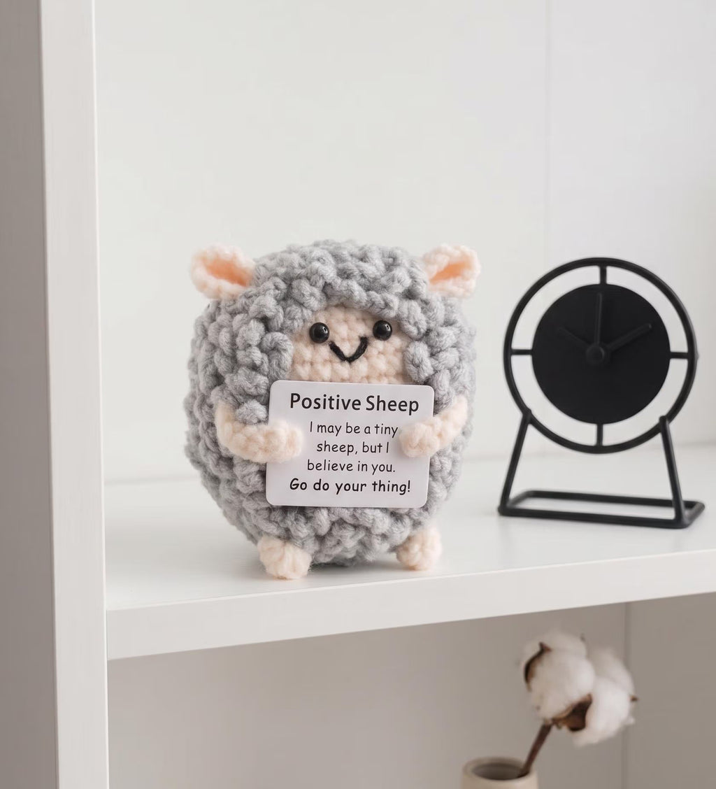 Crochet sheep plushie in soft white yarn